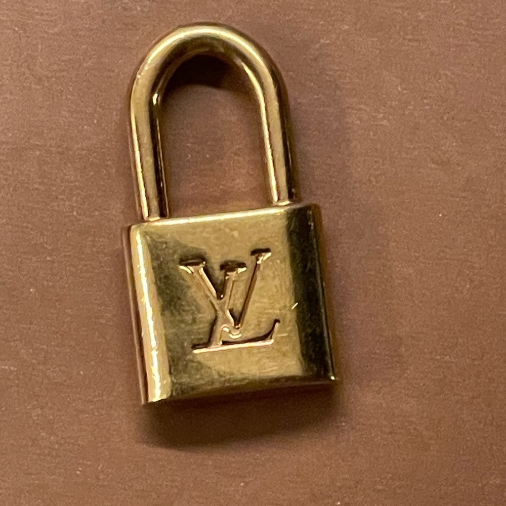 Authentic Louis Vuitton padlock Pendant